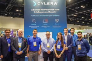 The Cylera team at Cylera's booth in the CyberCommand Center