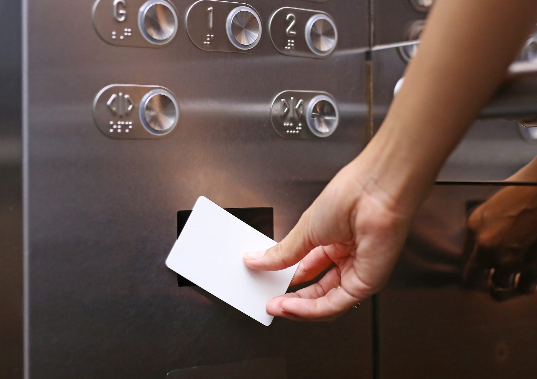 A smart keycard being used on a campus security access control system, an IoT device that is secured using Cylera’s automated network segmentation policies and integrations with firewall and NAC solutions.