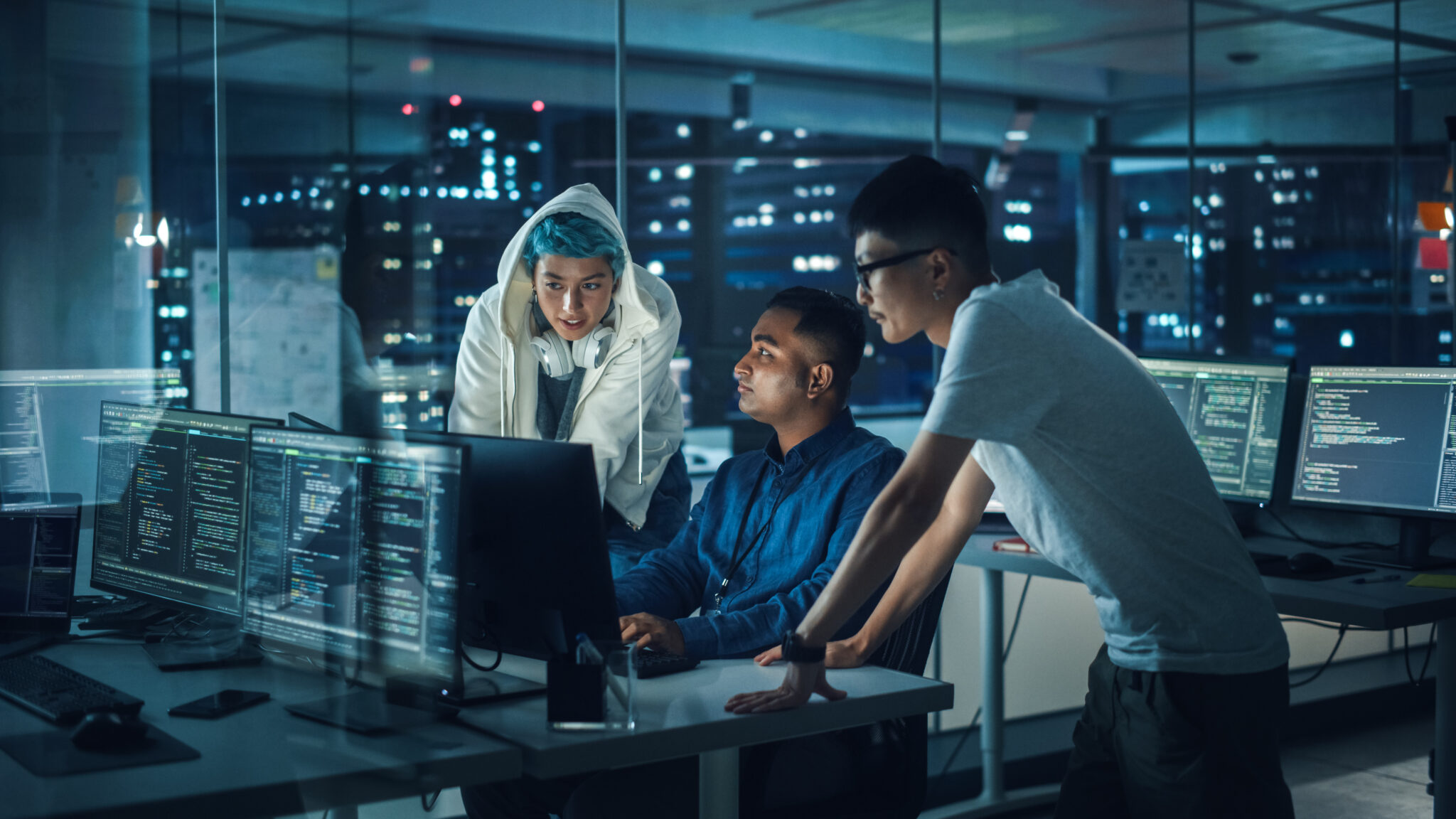 University students in a computer lab working with IoT-connected devices, securely monitored and protected on the campus network using Cylera’s cybersecurity platform.